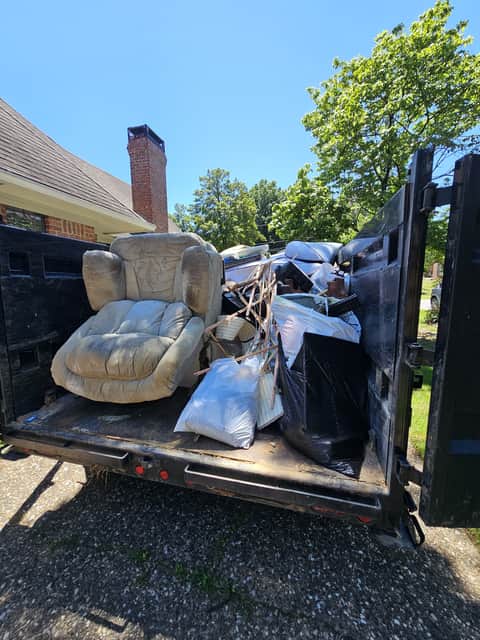 Cleaning and junk removal work by Xenya's LLC in Central Arkansas