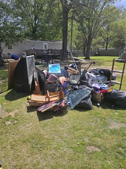 Cleaning and junk removal work by Xenya's LLC in Central Arkansas